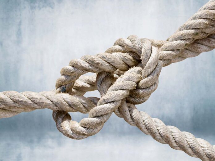 Einige arbeitsrechtliche Instrumente zur Mitarbeiterbindung halten den Mitarbeiter eher unfreiwillig im Unternehmen. Foto: janvier_adobe.stock.com